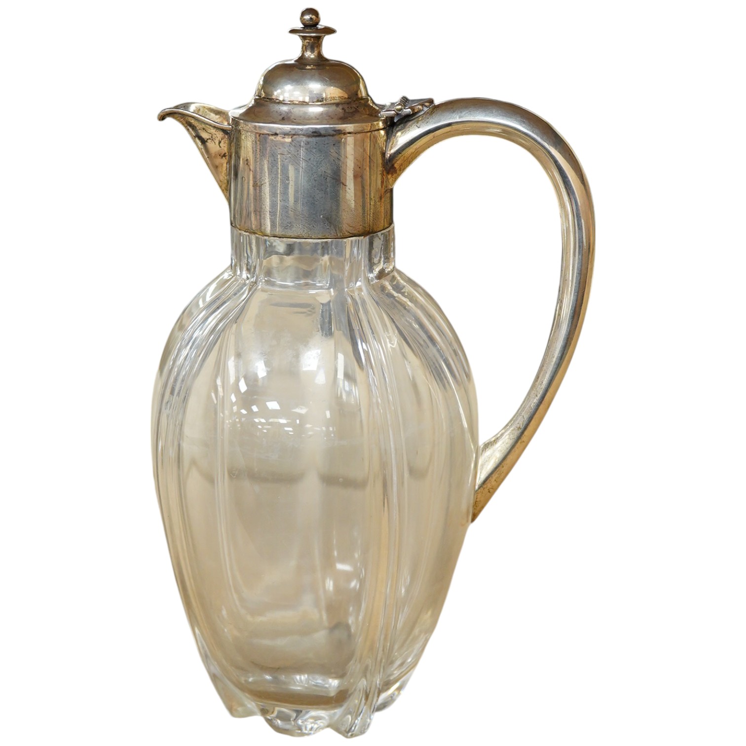 An Edwardian silver mounted glass claret jug, William Henry Leather, Birmingham, 1901, 25.3cm. Condition - poor